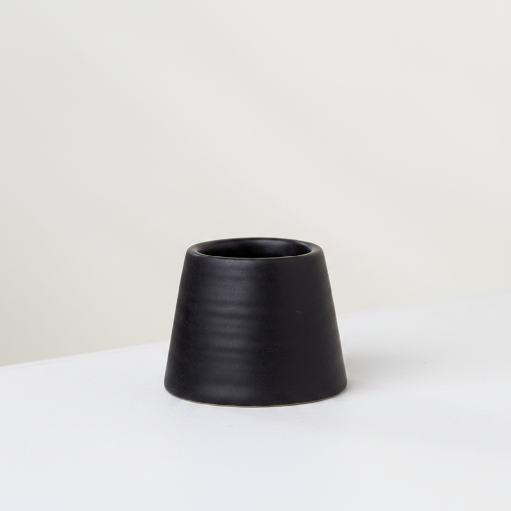 Black ceramic match holder studio